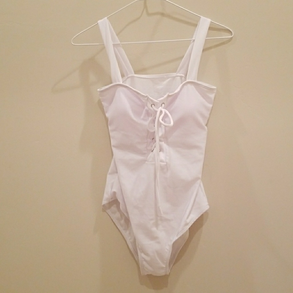New,Beautiful white lace up one piece bathing suit